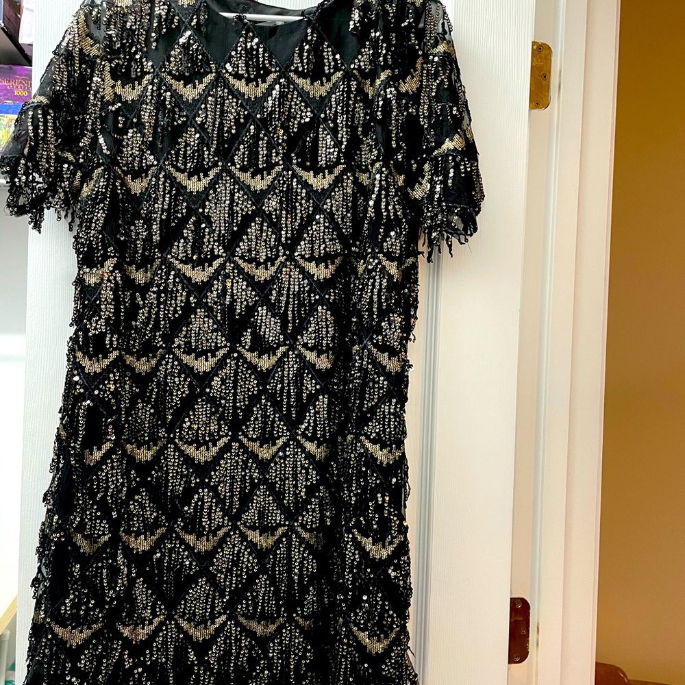Black and gold sequin dress